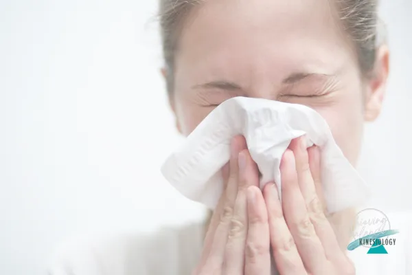 lady blowing nose
