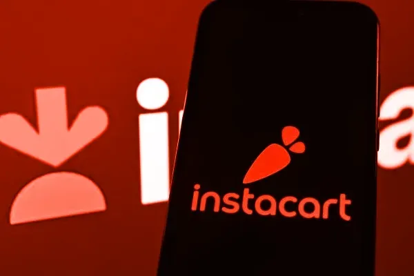 iPhone showing a red Instacart logo