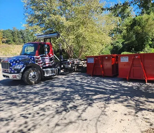 Dumpster being delivered