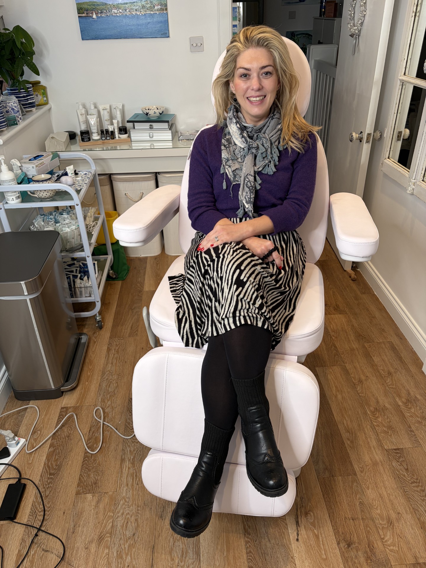 Dr Amber Halliday in her new clinic chair at Blue Bird Aesthetics, providing safe, doctor‑led aesthetic care in Worthing