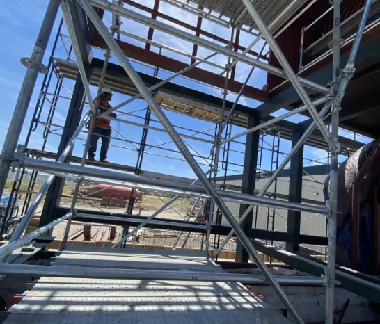 Elite Scaffolding crew installing construction scaffolding on California job site