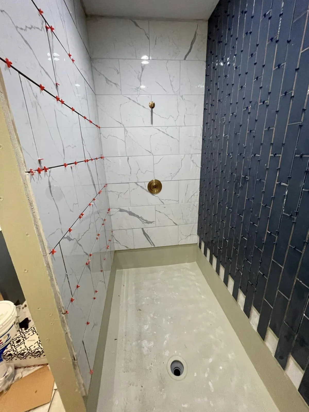 Luxury tile shower with recessed niche in Evans GA bathroom