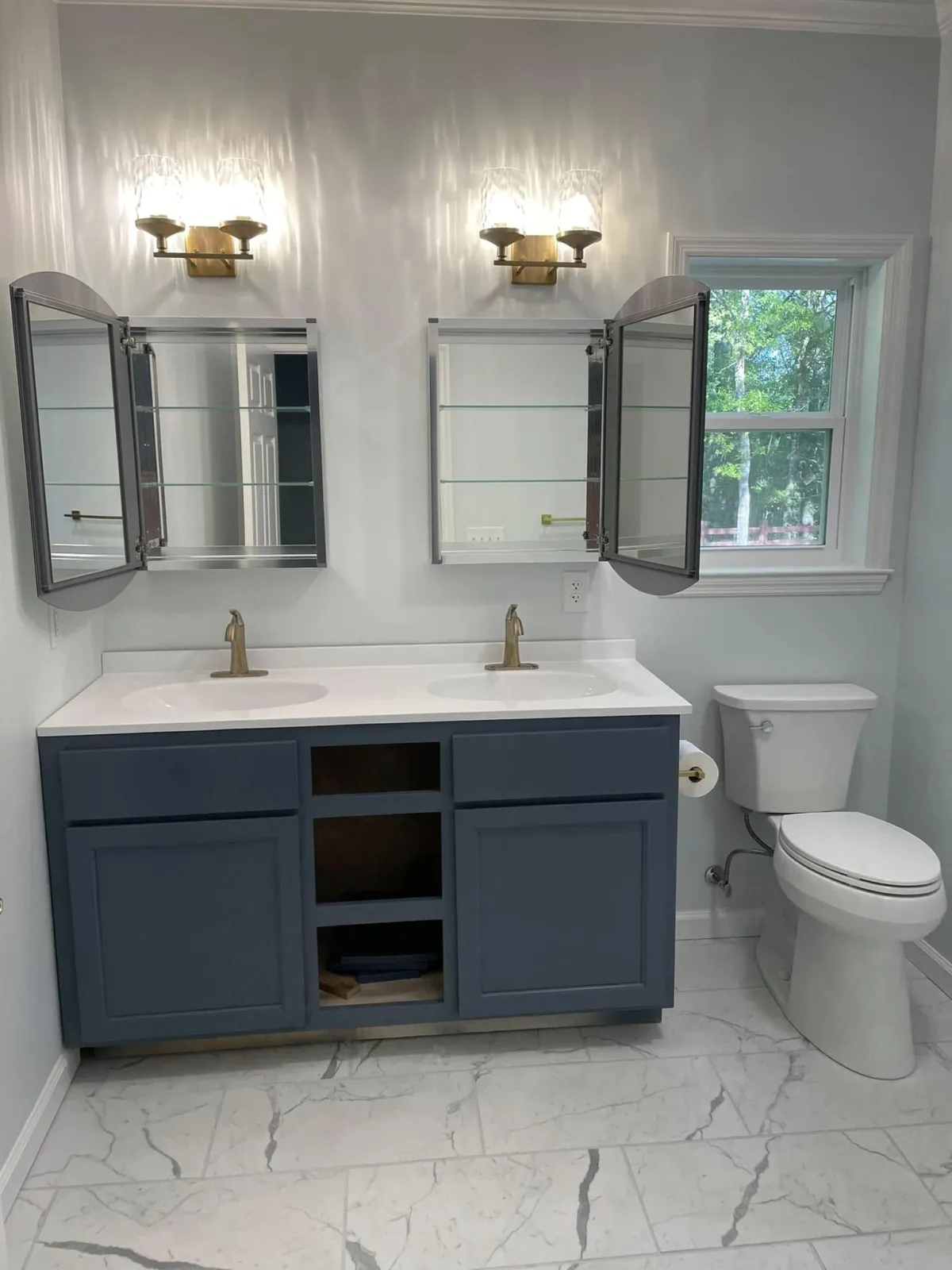 Bathroom lighting and mirror upgrade in Columbia County home