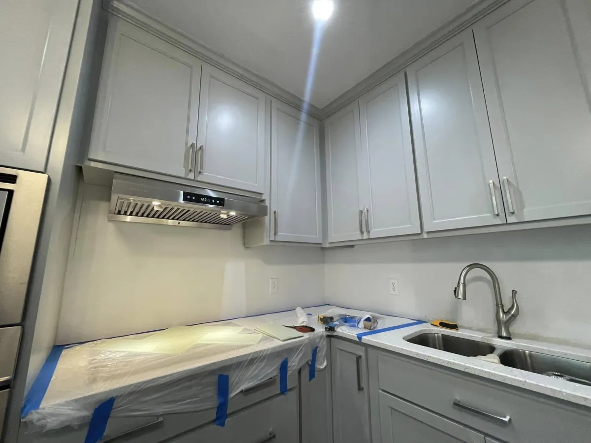 Completed kitchenette with stainless steel sink and modern fixtures in Evans GA