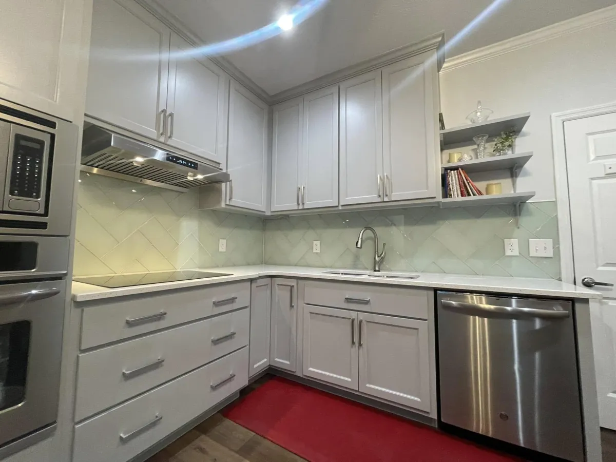 Completed kitchenette with stainless steel sink and modern fixtures in Evans GA