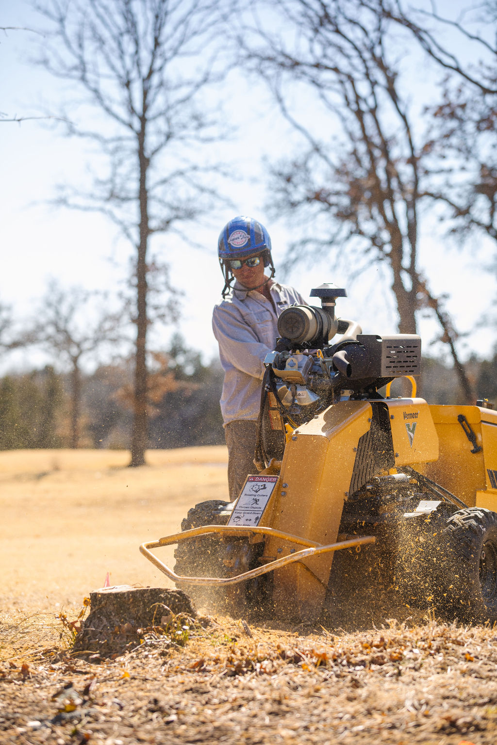 Man-Using-Stump-Grinder-Machine