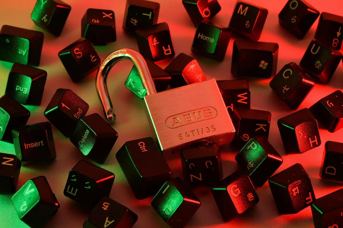 A padlock surrounded by keys from a keyboard