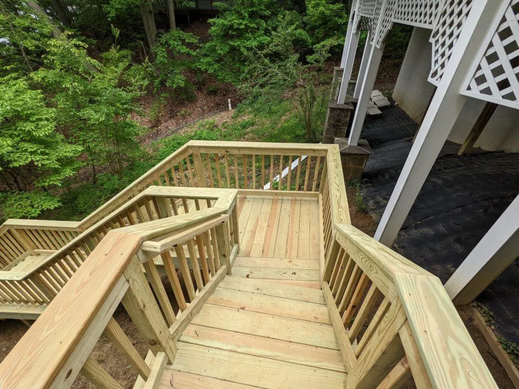 Wood deck with stairs by Wyatt Built in Huntersville NC