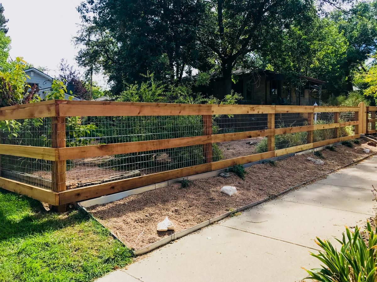 Split rail wood fence by Wyatt Built in Cornelius NC