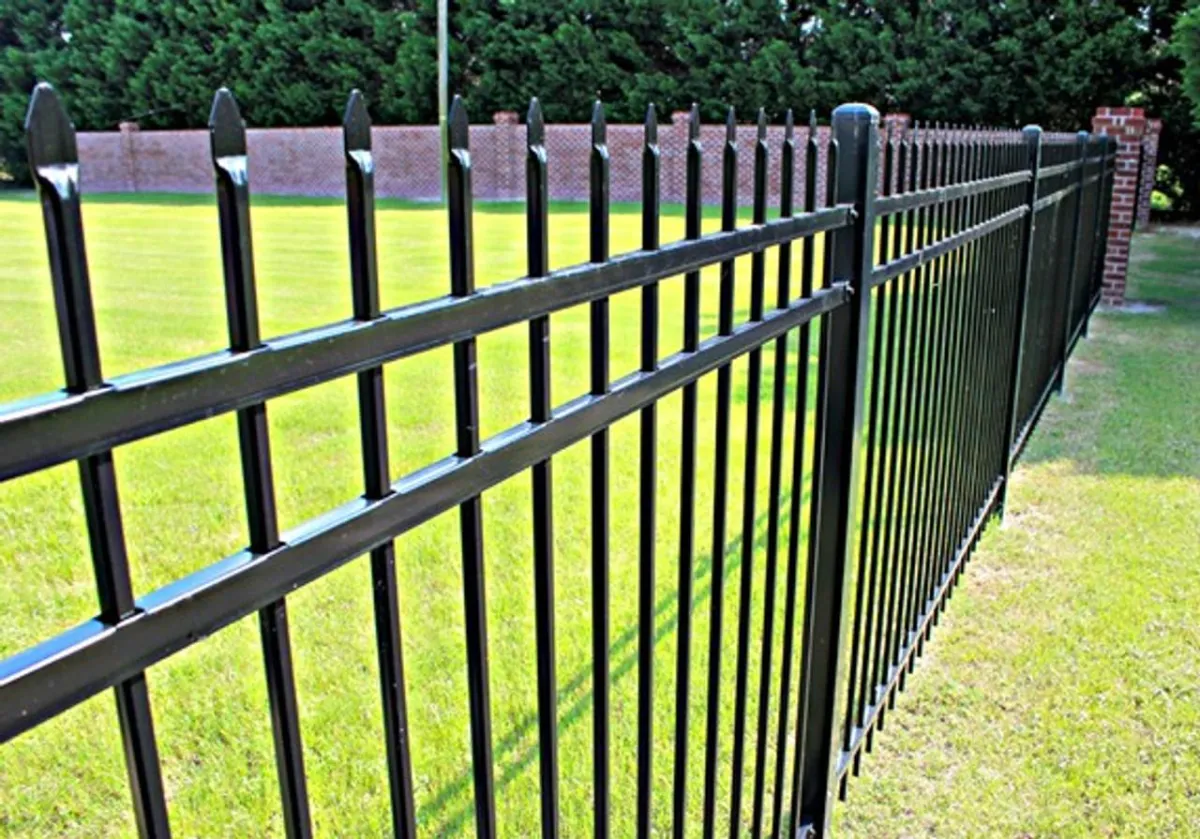 Spear-top aluminum fence by Wyatt Built in Huntersville NC