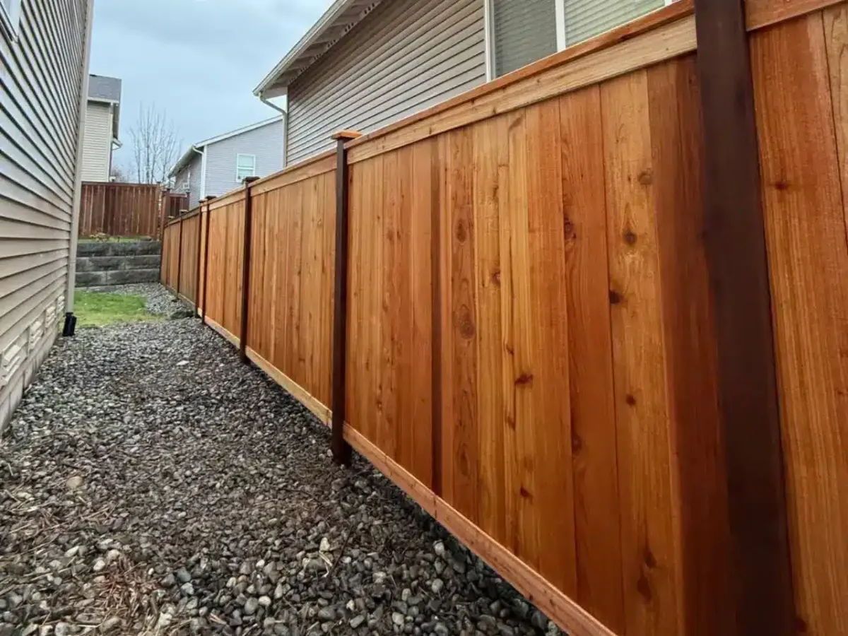 Stained wood privacy fence by Wyatt Built in Statesville NC