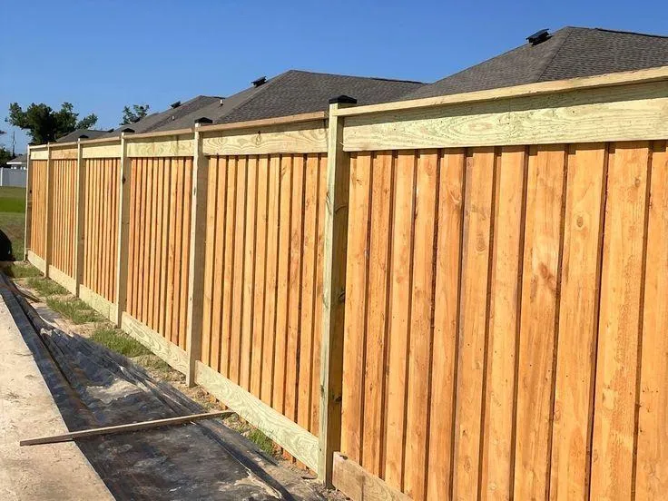 Board-on-board wood fence by Wyatt Built in Davidson NC
