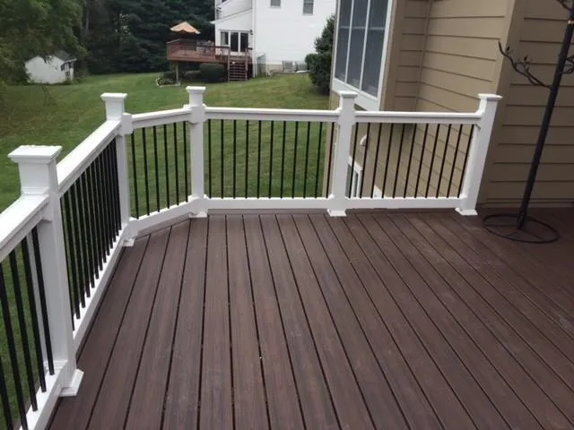 Vinyl railing with decorative balusters by Wyatt Built in Cornelius NC