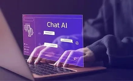 A person's hands are typing on a laptop with a glowing, transparent digital interface titled "Chat AI" overlaid on the screen. The interface shows chat bubbles and icons, representing an interaction with an artificial intelligence chatbot.