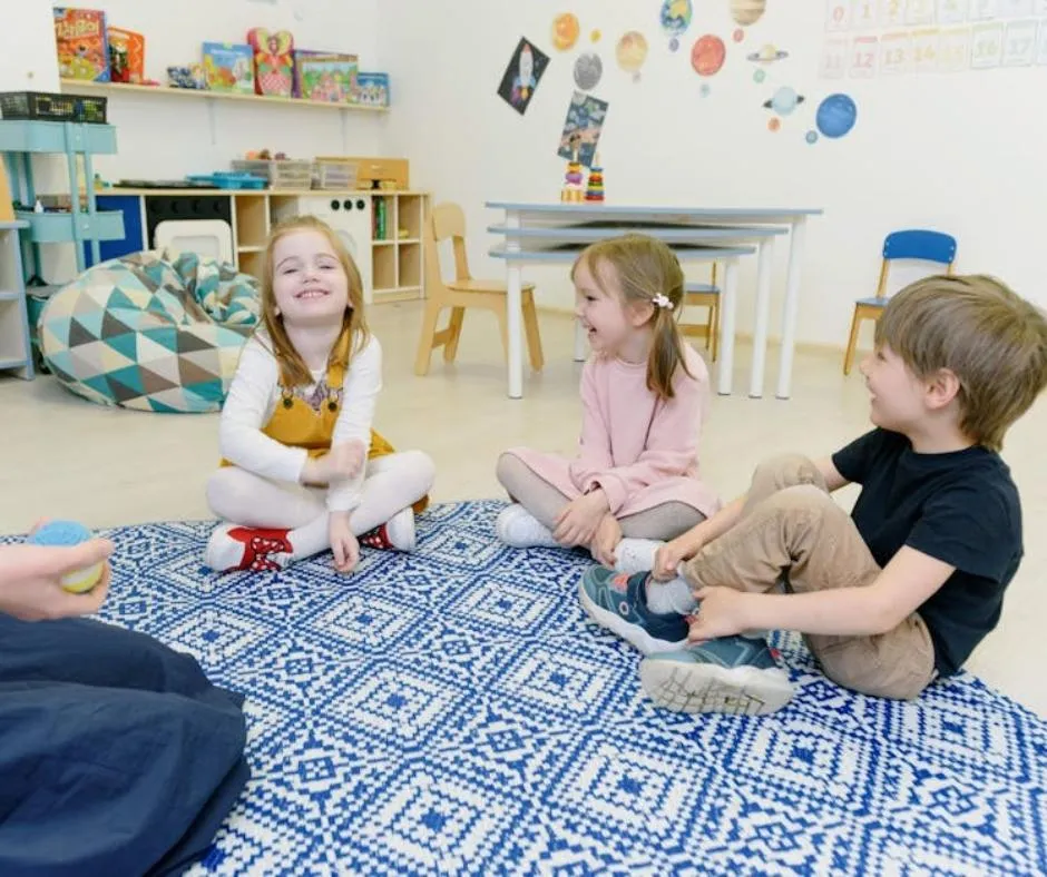 kids sitting in a daycare classroom