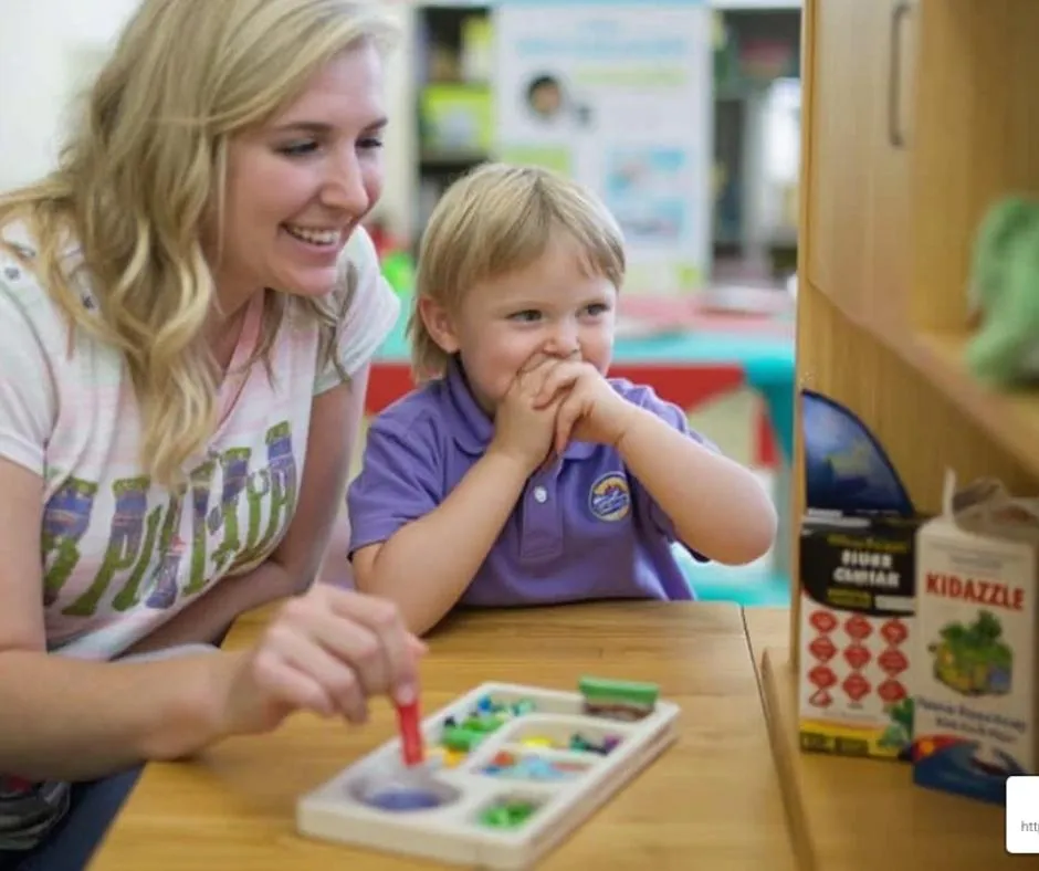 a woman and a child playing