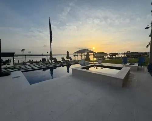 Outback Lounger Barrier Reef Fiberglass Inground Pool in a backyard in Indianapolis Indiana by Jensen's Pools and More