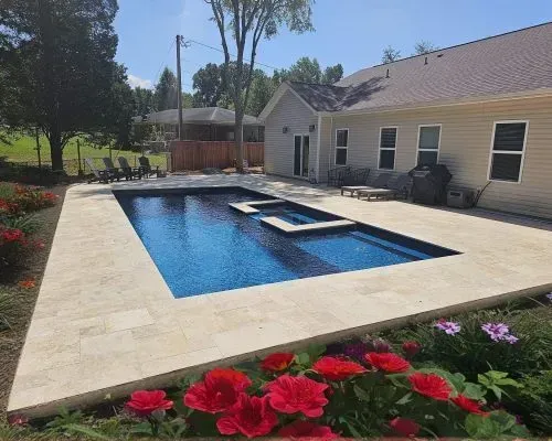 Sydney Harbour Barrier Reef Fiberglass Inground Pool in a backyard in Indianapolis Indiana by Jensen's Pools and More