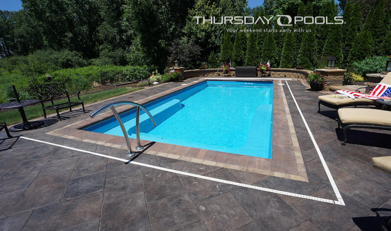 Lil Bob Thursday Pools Fiberglass Inground Pool in a backyard in Indianapolis Indiana by Jensen's Pools and More