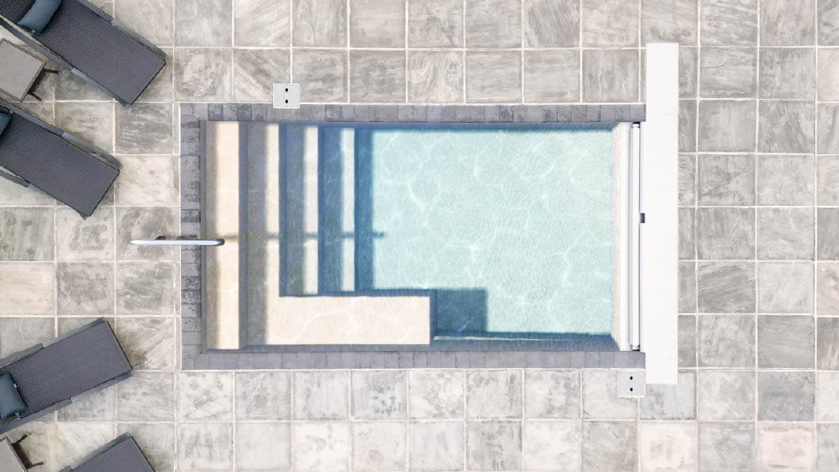 The Nook Thursday Pools Fiberglass Inground Pool in a backyard in Indianapolis Indiana by Jensen's Pools and More