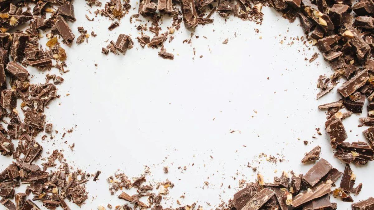 grated chocolate on white background