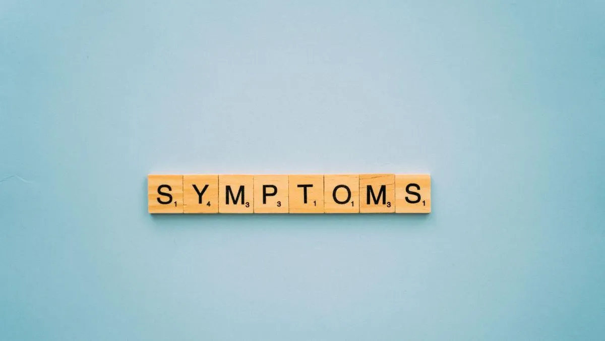 blog graphic with tiles spelling out symptoms