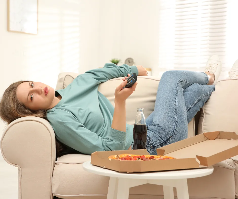 Procrastination - woman on couch
