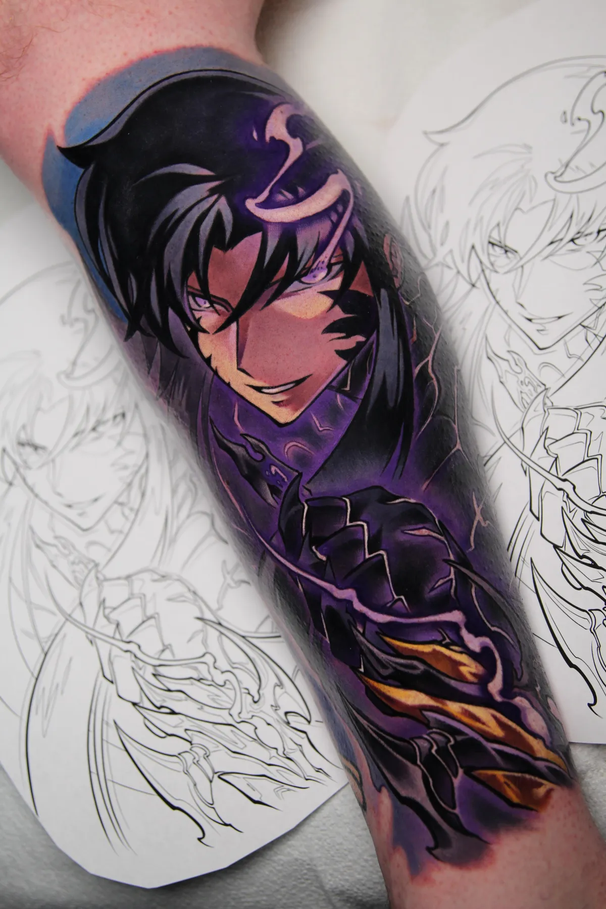 A striking anime tattoo of Sung Jin-Woo, showcasing his intense aura and shadow-infused power, with bold contrasts and intricate details that bring the legendary hunter to life.Tattooed by Orlando anime tattoo artist Ren Behan at xsadfamx