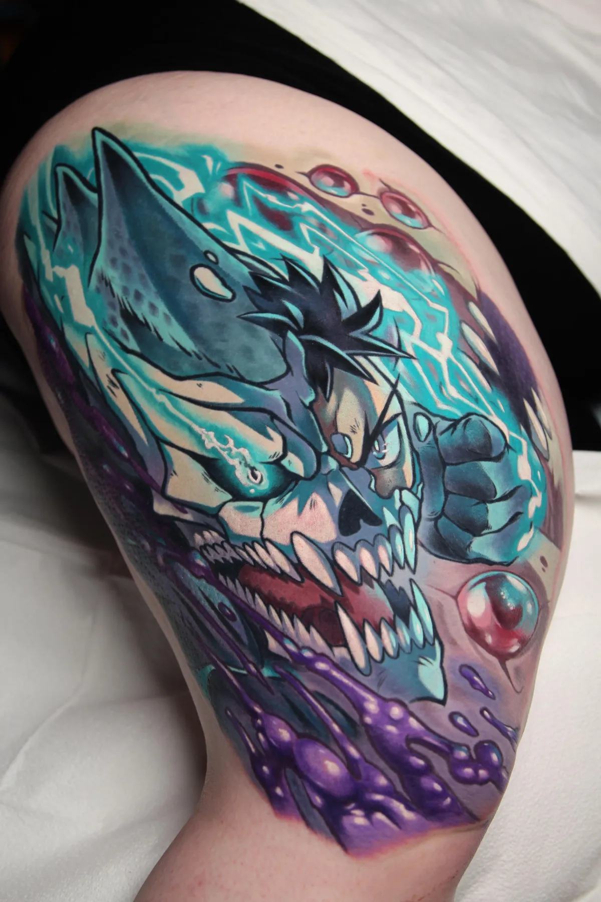 A bold and dynamic tattoo of Kaiju No. 8, featuring intense shading and intricate details that capture the raw power and monstrous transformation of Kafka Hibino. Tattooed by Orlando anime tattoo artist Ren Behan at xsadfamx