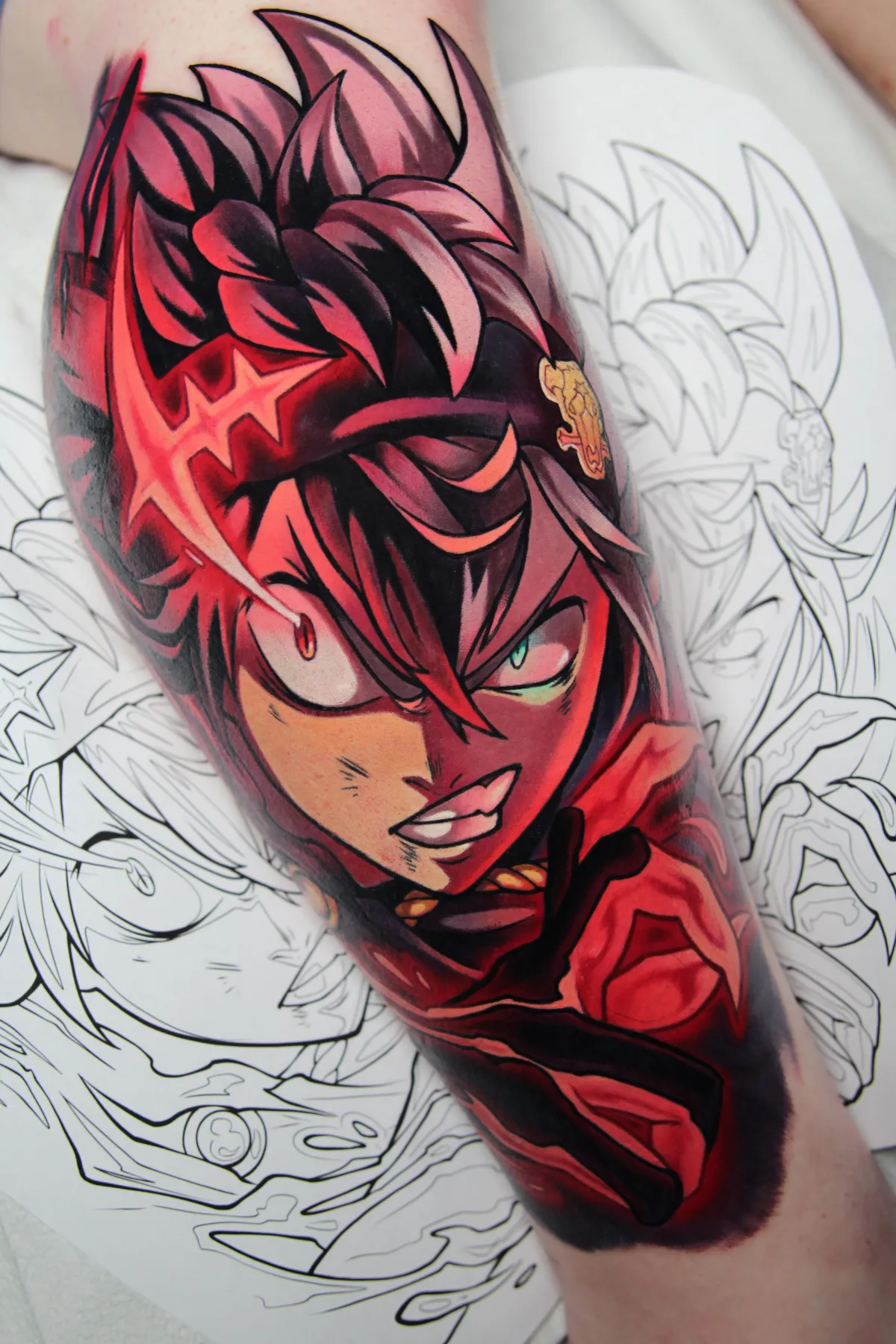 Anime tattoo of Asta from Black Clover. This Black Clover tattoo features an intense expression with explosive glowing elements. Completed by Orlando Anime Tattoo Artitst Ren Behan located at xsadfamx tattoos. 