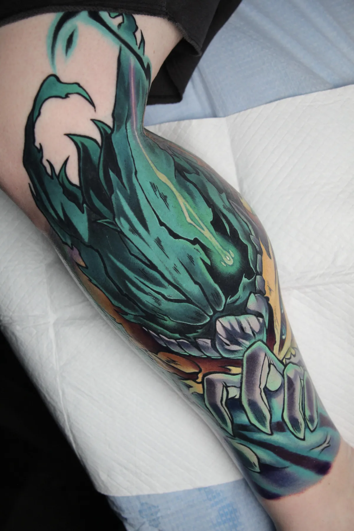 Dark Deku tattoo by Orlando Anime Tattoo Artist Ren Behan. Tattoo is mostly healed with smooth vibrant gradients and bold lines.