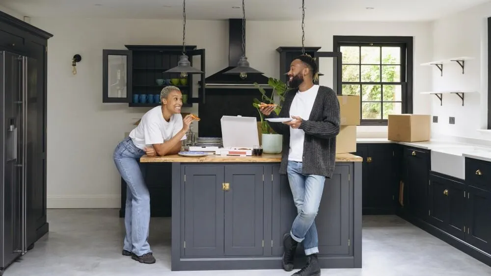 Couple Enjoing their new modern kitchen