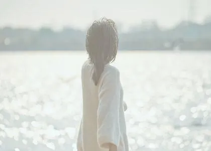 calm woman looking out to sea