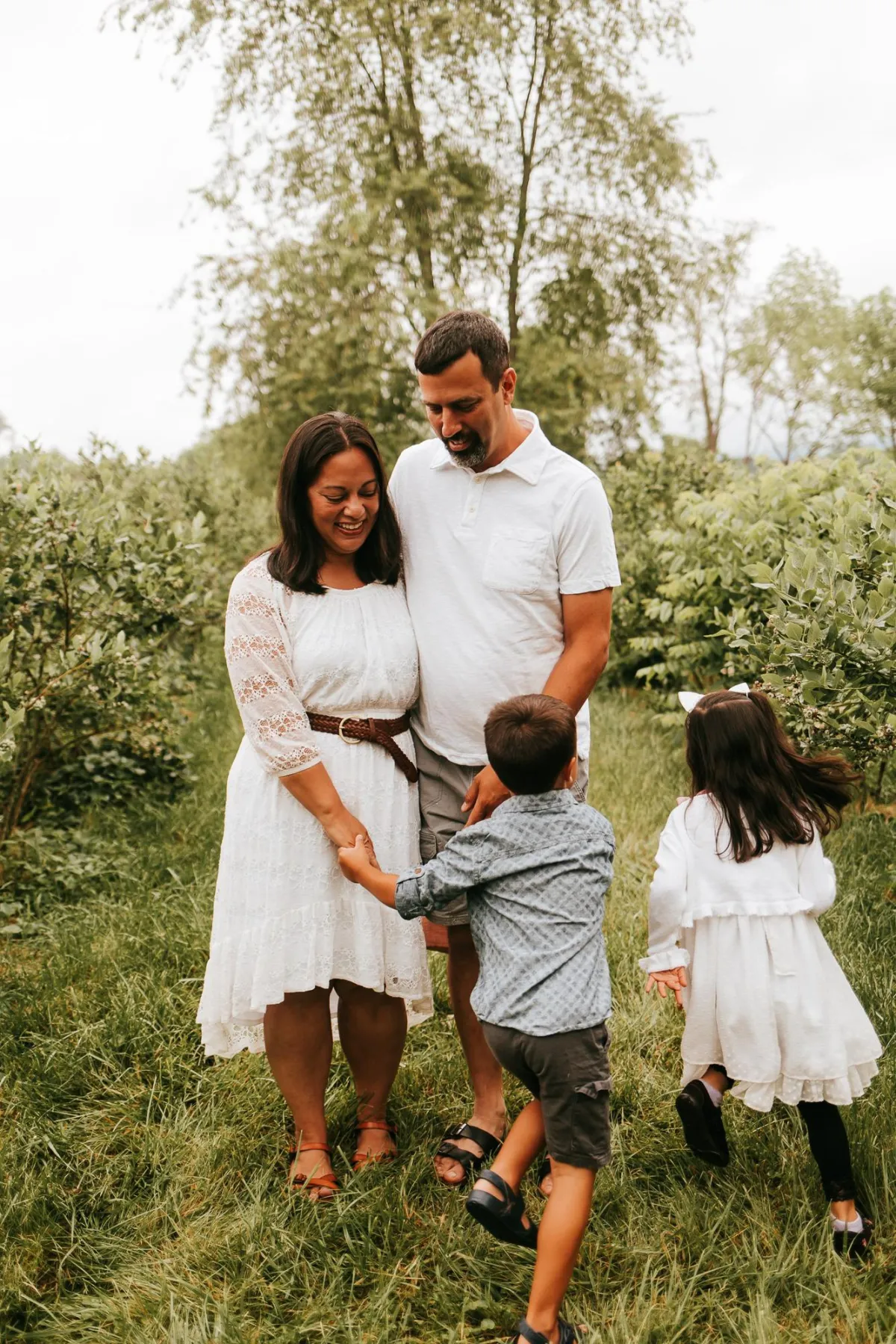 Suffolk family photographer taking photos of family photoshoot
