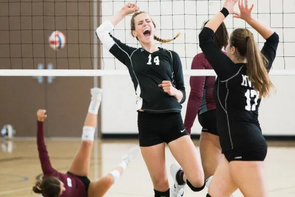Image of a volleyball player demonstrating mental toughness and focus during a match.