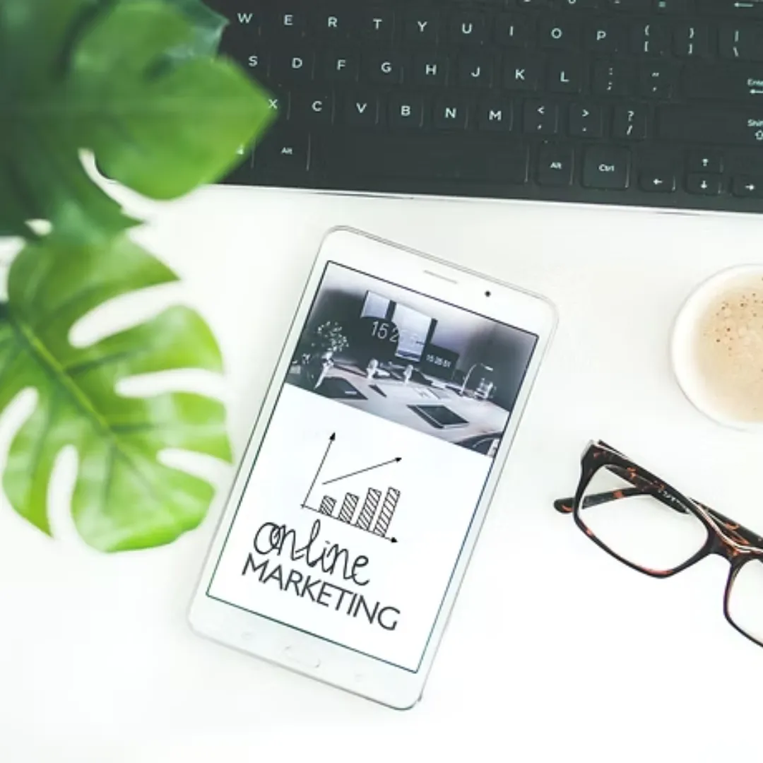 consultants desk with an ipad showing online marketing