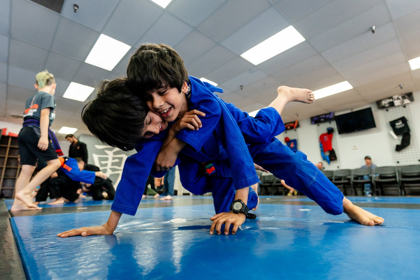 Children practicing Jiu Jitsu at Ultimate Martial Arts Fresno
