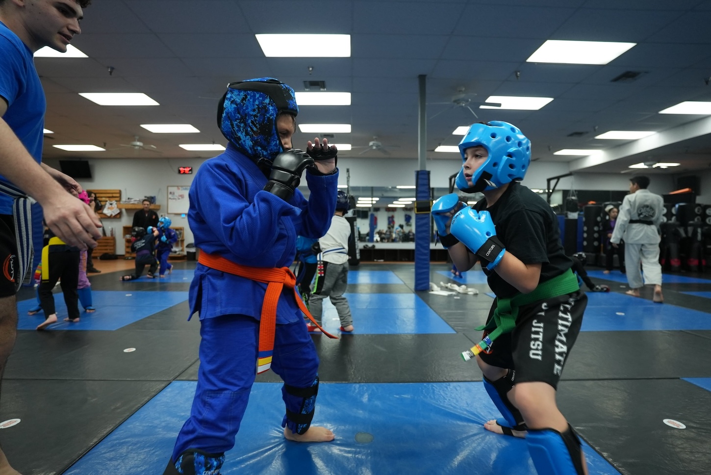 Kids training Jiu Jitsu in Fresno at Ultimate Martial Arts during class