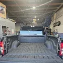 black spray in bed liner with tailgate open