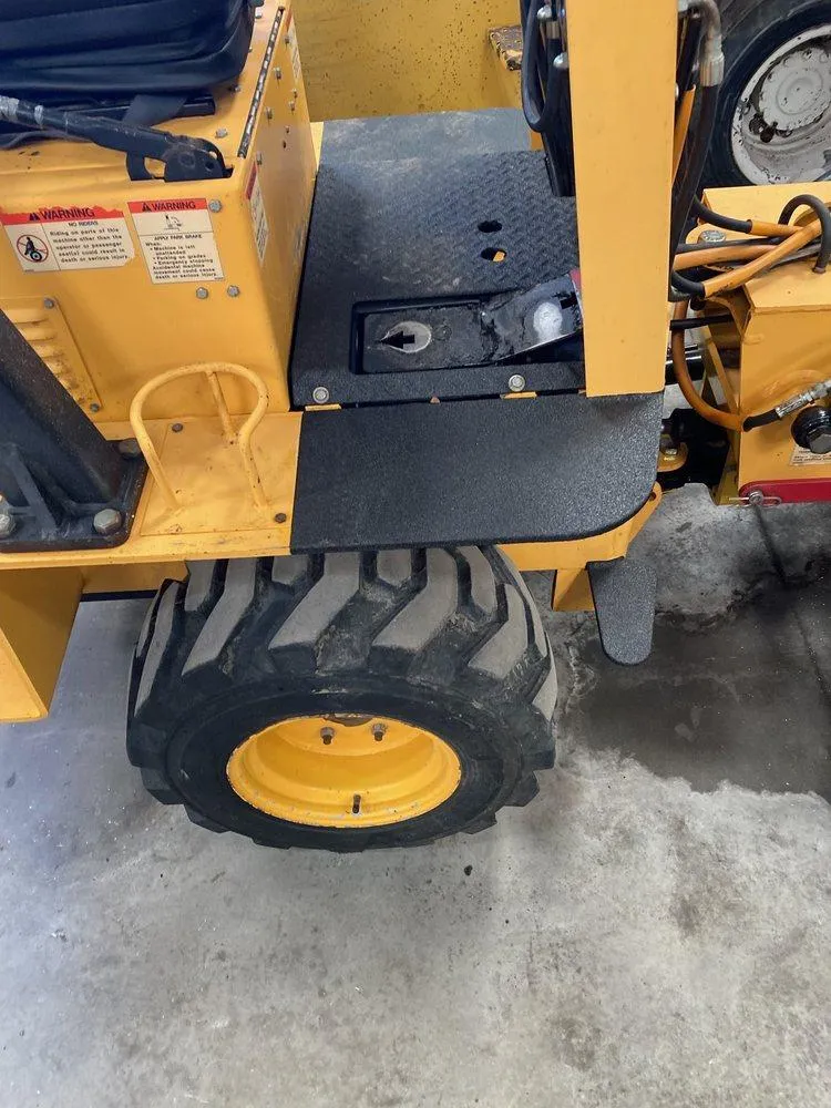Forklift with sprayed operator cab floorboard 