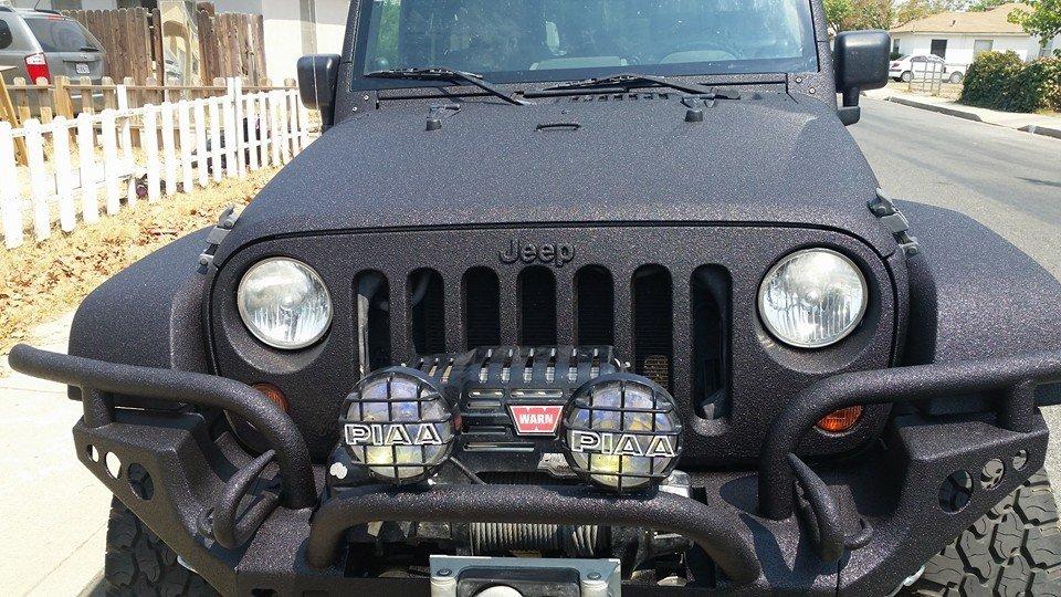 black sprayed Jeep front view