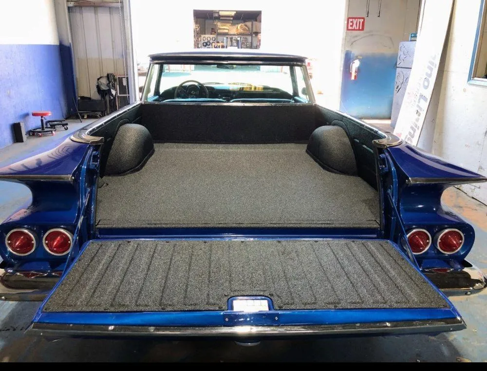 blue ranchero with black sprayed bedliner
