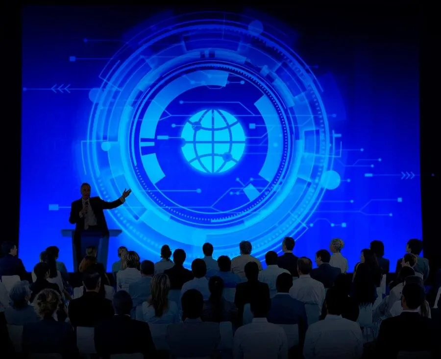 Man Giving Presentation to Large Audience - Transforming Businesses