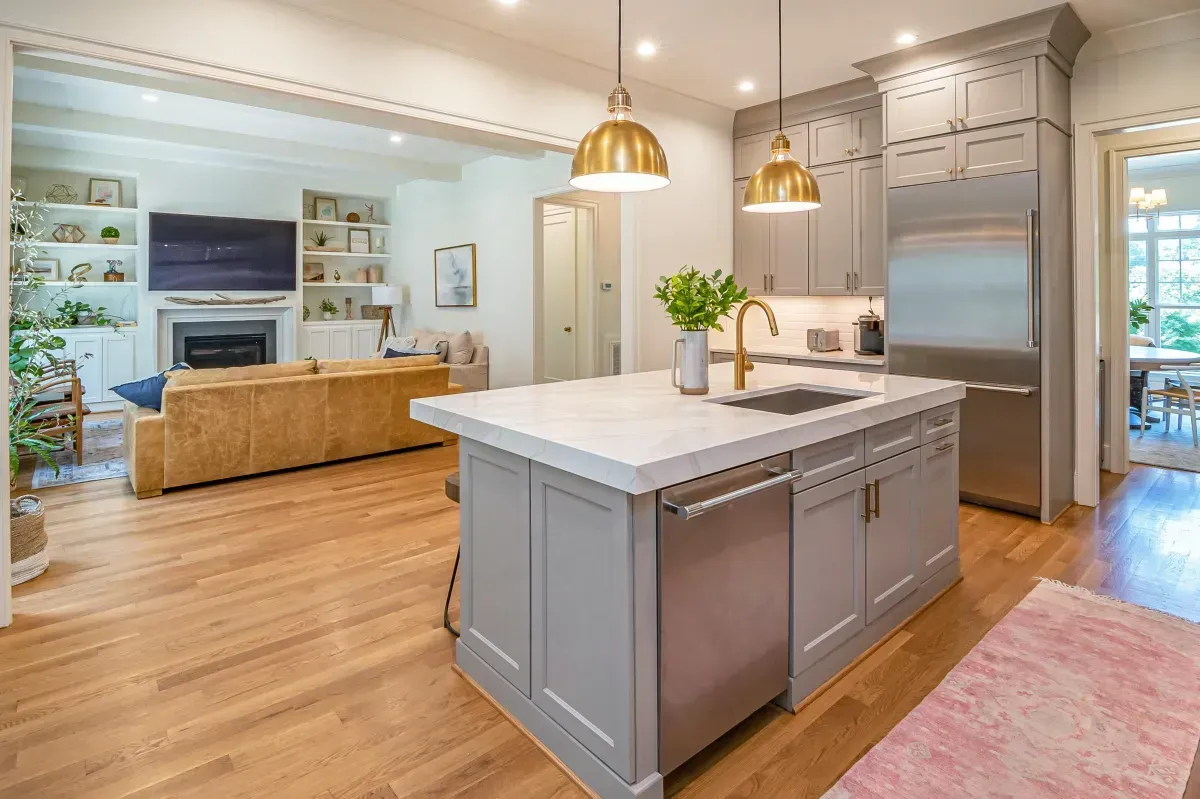 Bright kitchen renovation in the Greater Charlotte area featuring new cabinetry and lighting
