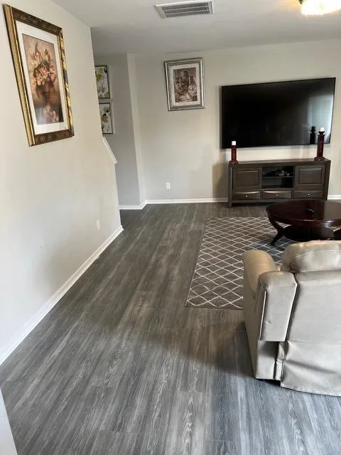 Finished basement in Davidson featuring a media room and sound-conscious design