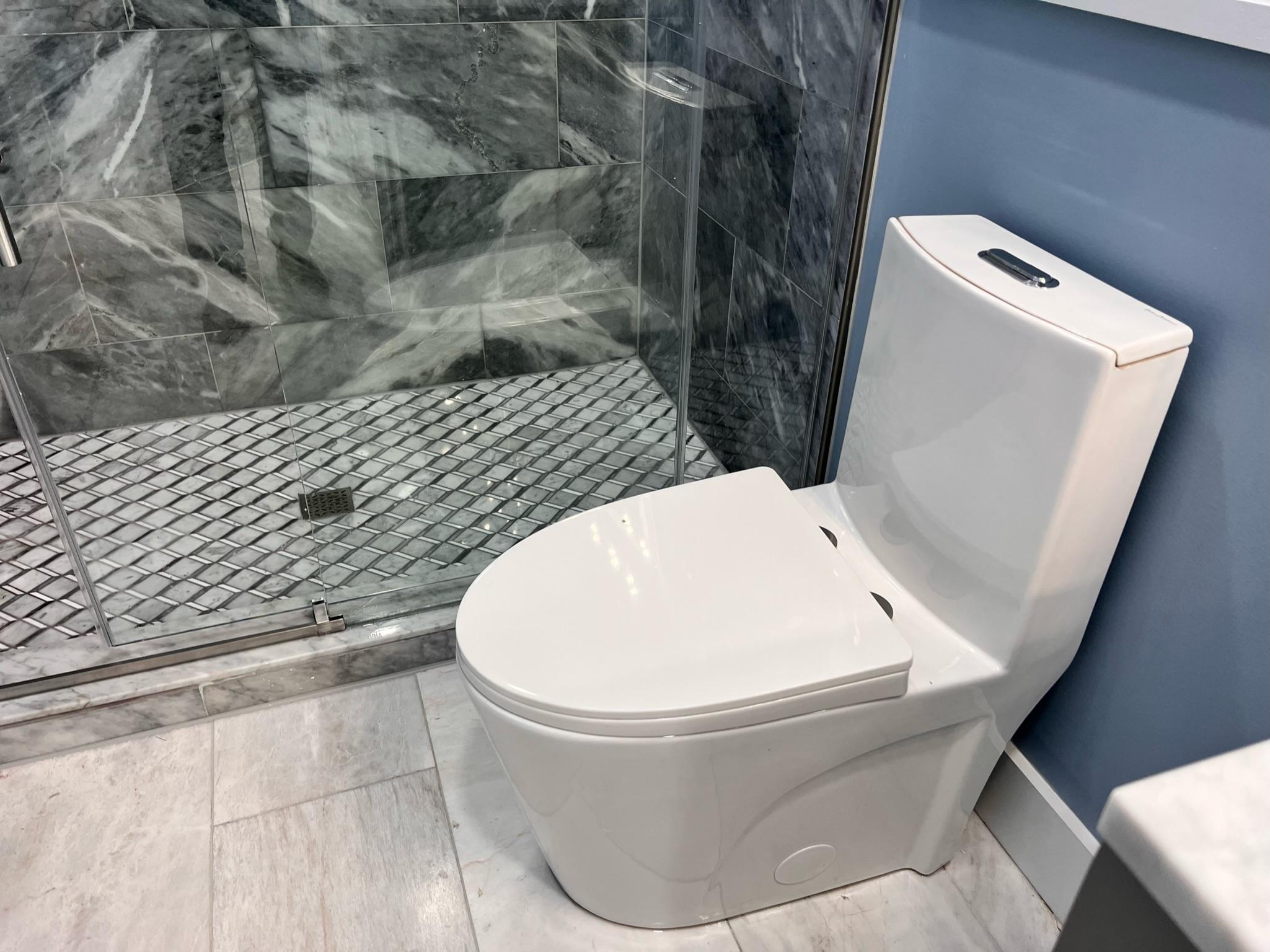 Master bathroom renovation in Matthews featuring a freestanding tub and modern finishes