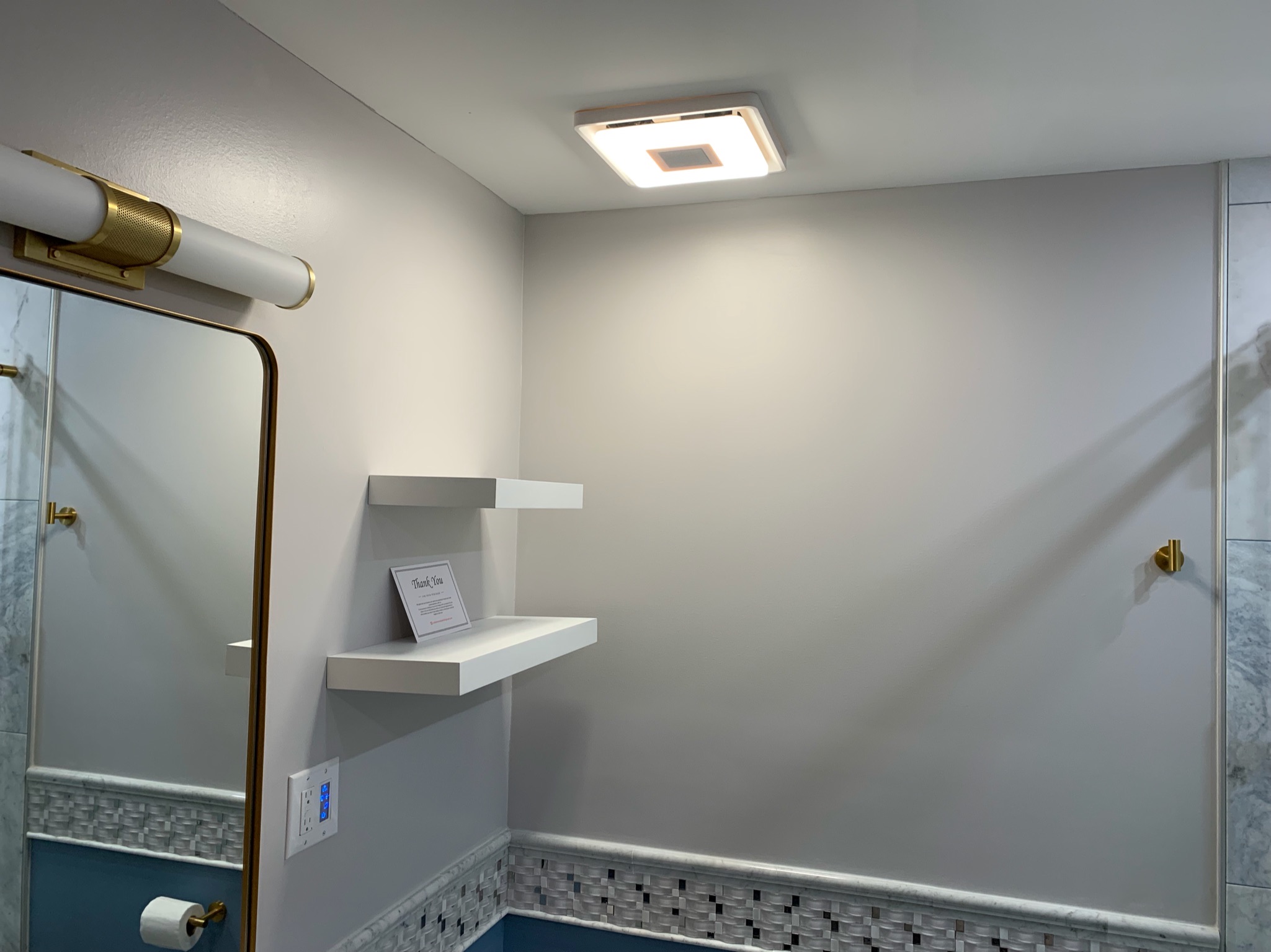 Master bathroom remodeling in Huntersville featuring a double vanity and upgraded lighting