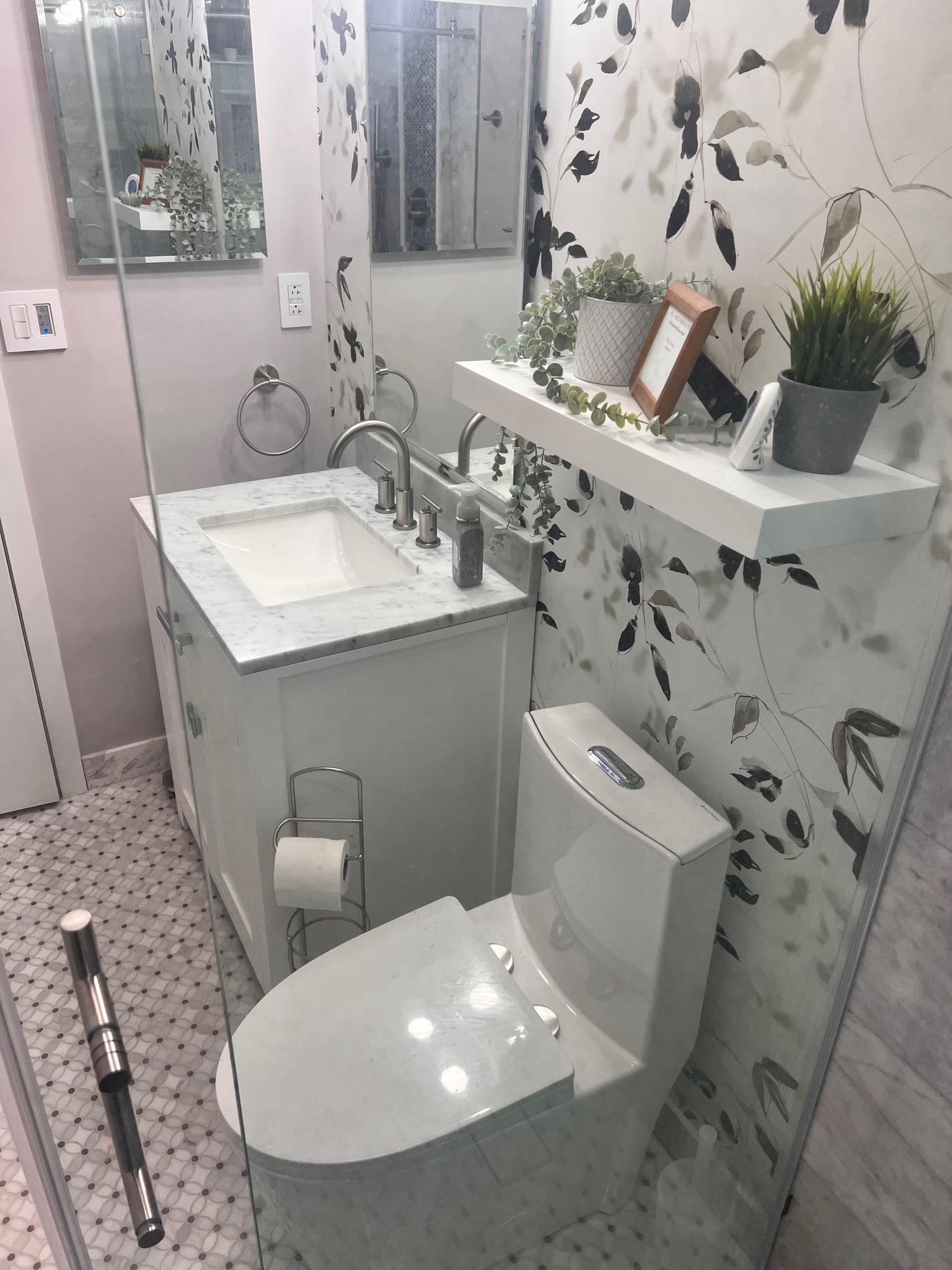 Master bathroom remodel in Cornelius featuring improved storage and a spacious shower layout