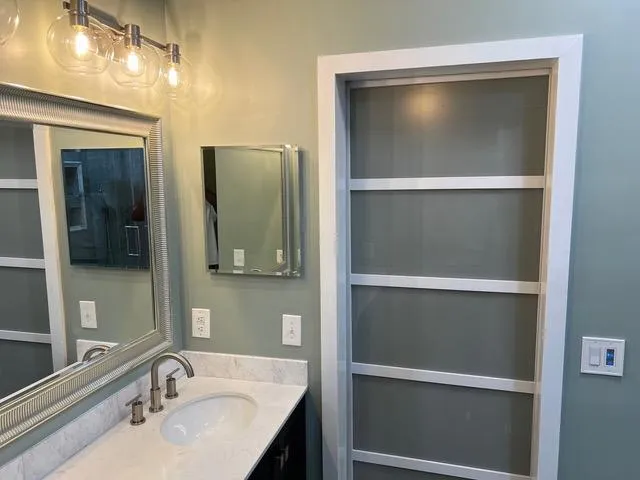 Bathroom addition in Charlotte featuring a compact layout and clean finishes