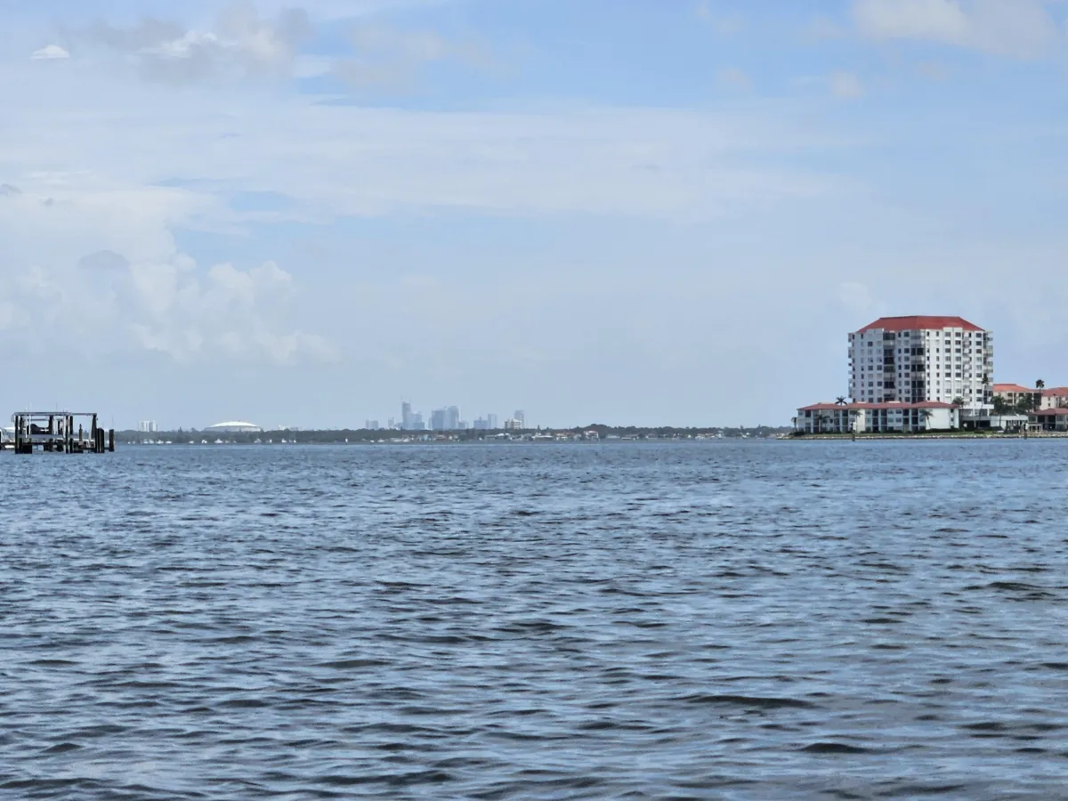 Open ocean with city in the horizon